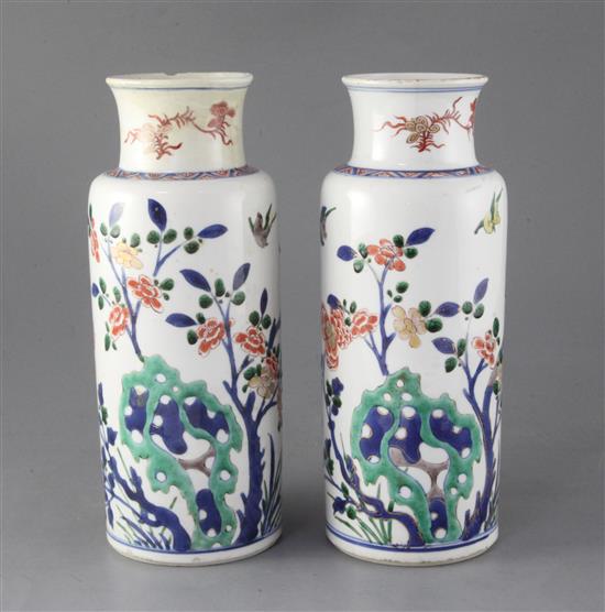 A pair of Chinese wucai cylindrical vases, Kangxi period, late 17th century, 26.5cm high, faults